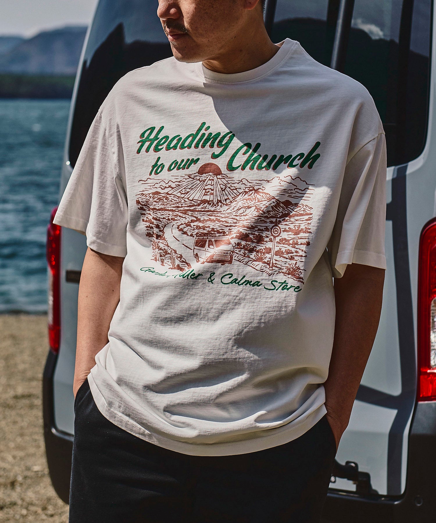 CALMA STORE グラフィック ヘディング TEE